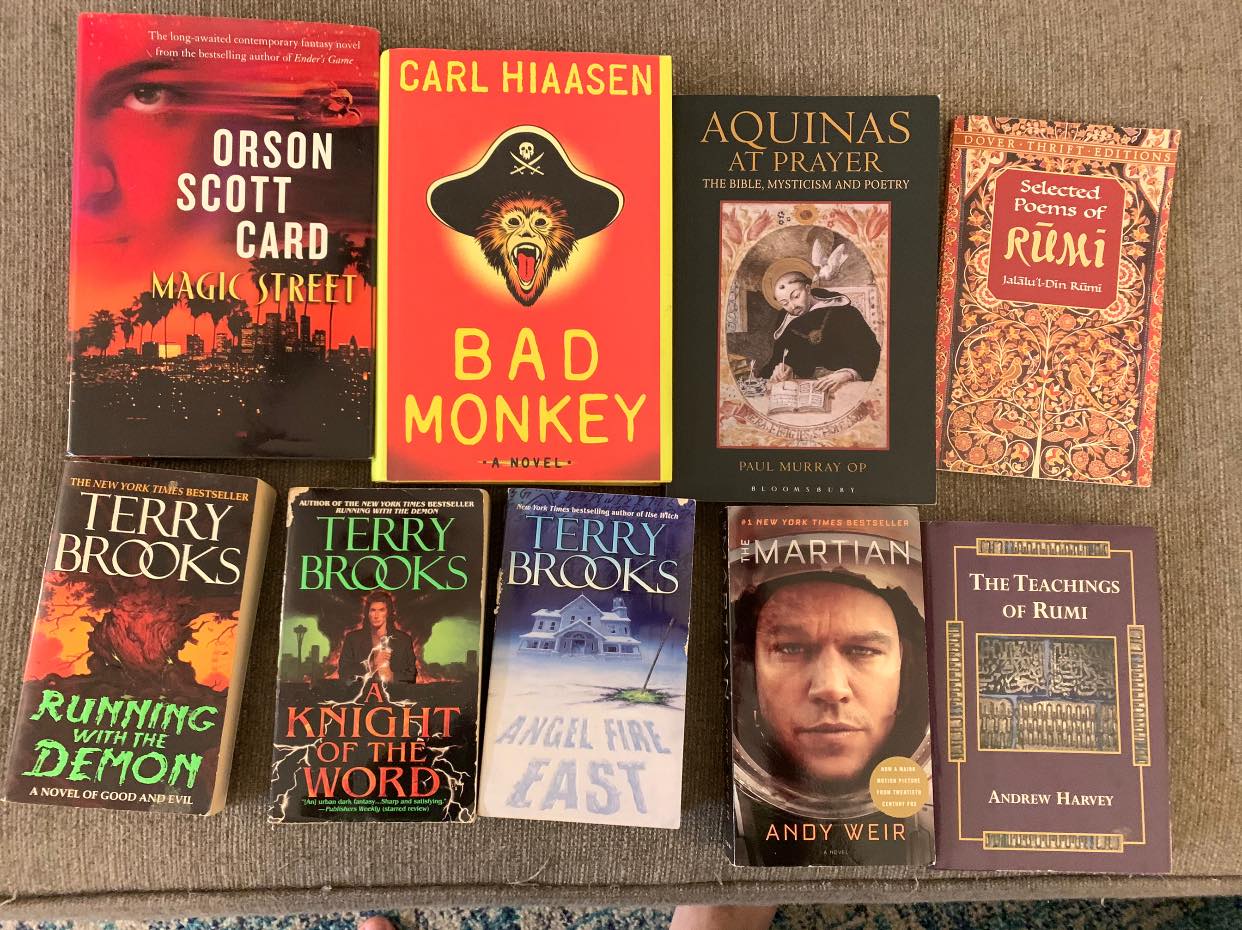 Various books laid out in grid.
